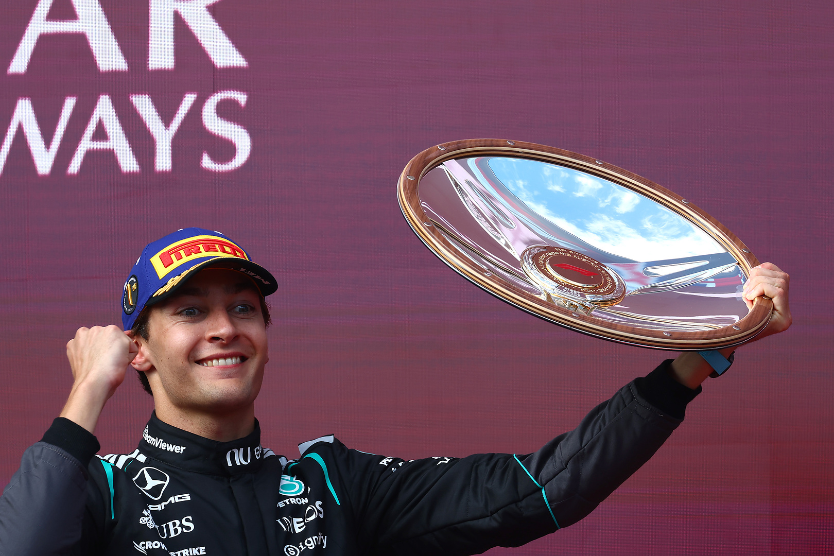 Australian Grand Prix, Sunday, Getty Images MELBOURNE, AUSTRALIA - MARCH 08: Race winner George Russell of Great Britain and Mercedes AMG Petronas F1 Team lifts his trophy on the podium during the F1 Grand Prix of Australia at Albert Park Grand Prix Circuit on March 08, 2026 in Melbourne, Australia. (Photo by Joe Portlock/Getty Images)