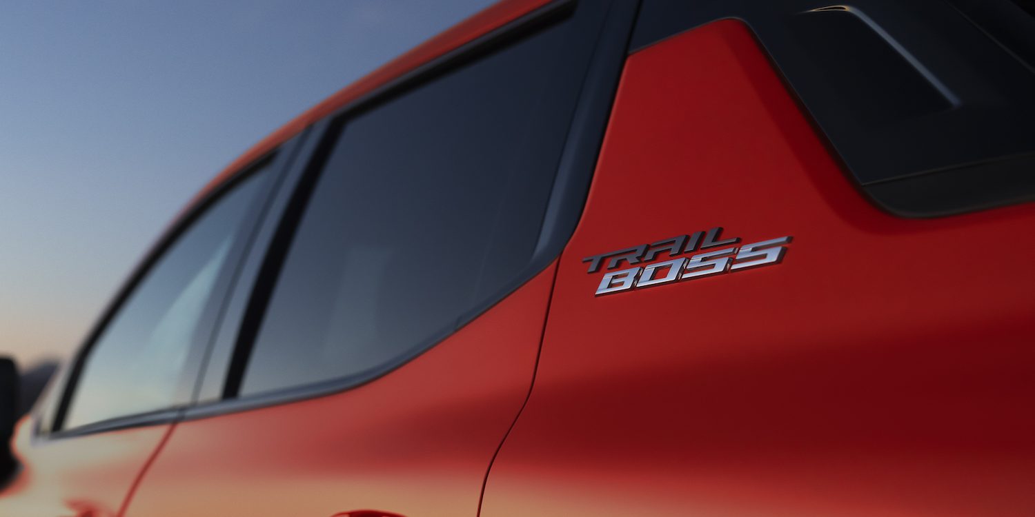 2026 Chevrolet Silverado EV Trail Boss Trail Boss badge details on the 2026 Silverado EV in Habanero Orange (image courtesy Chevrolet)