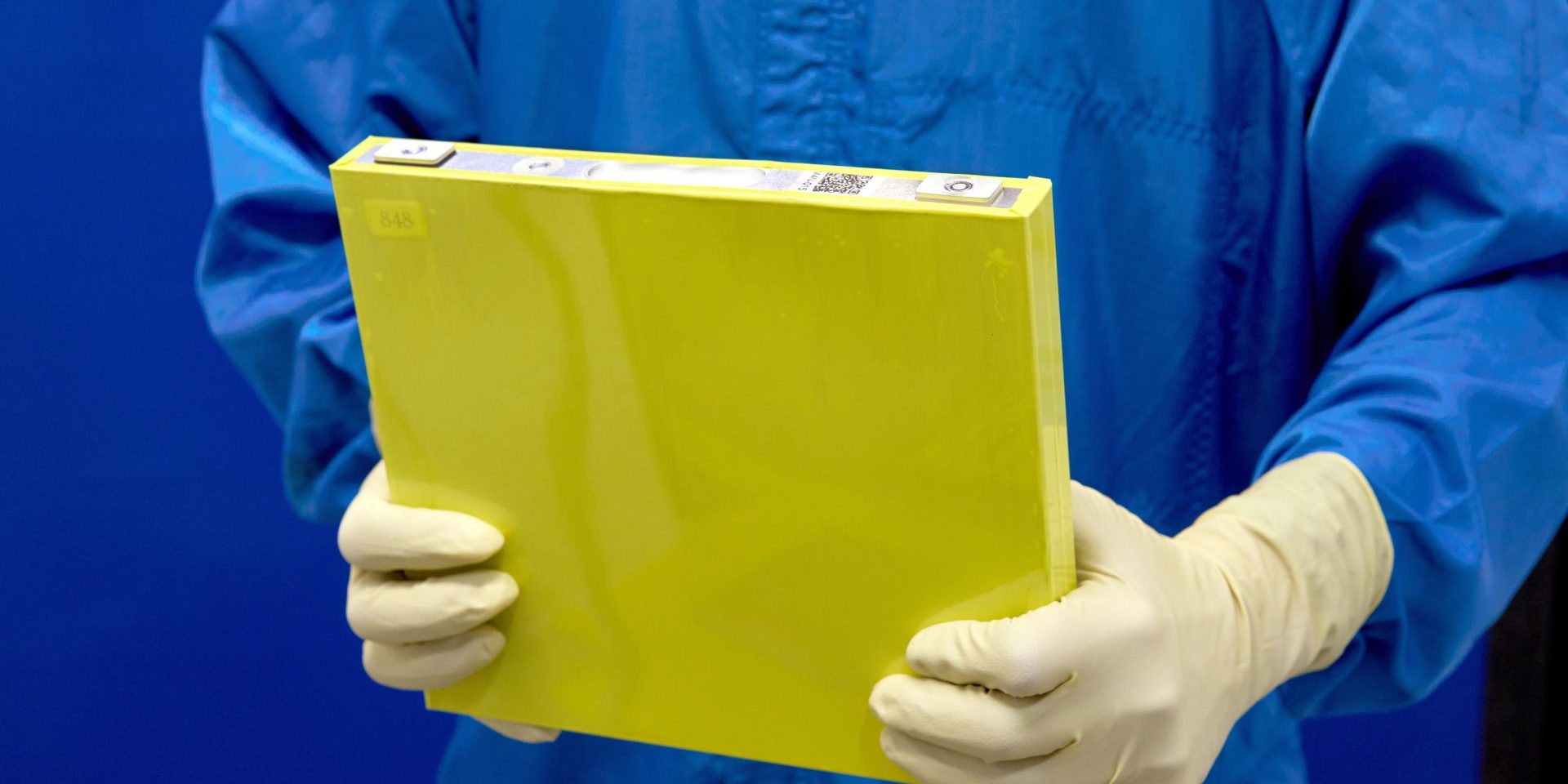 GM LMR Battery Cell An employee holds a full-size prototype LMR battery cell at the General Motors Wallace Battery Cell Innovation Center. GM has prototyped approximately 300 full-size LMR cells as it worked with LG Energy Solution to crack the code on the chemistry. (Photo by Steve Fecht for General Motors)