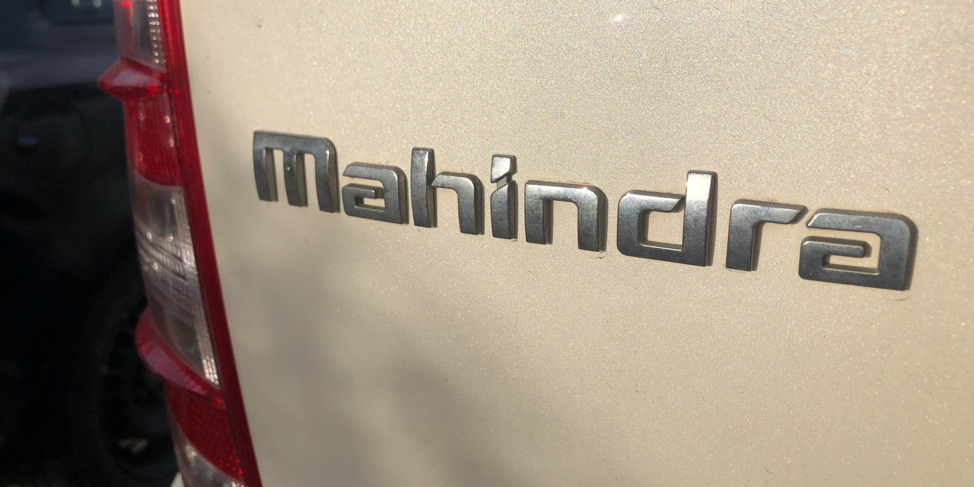 Emblem of Mahindra and Mahindra Limited, an Indian multinational vehicle manufacturing corporation (Photo by info.cineberg.com/Deposit Photos)