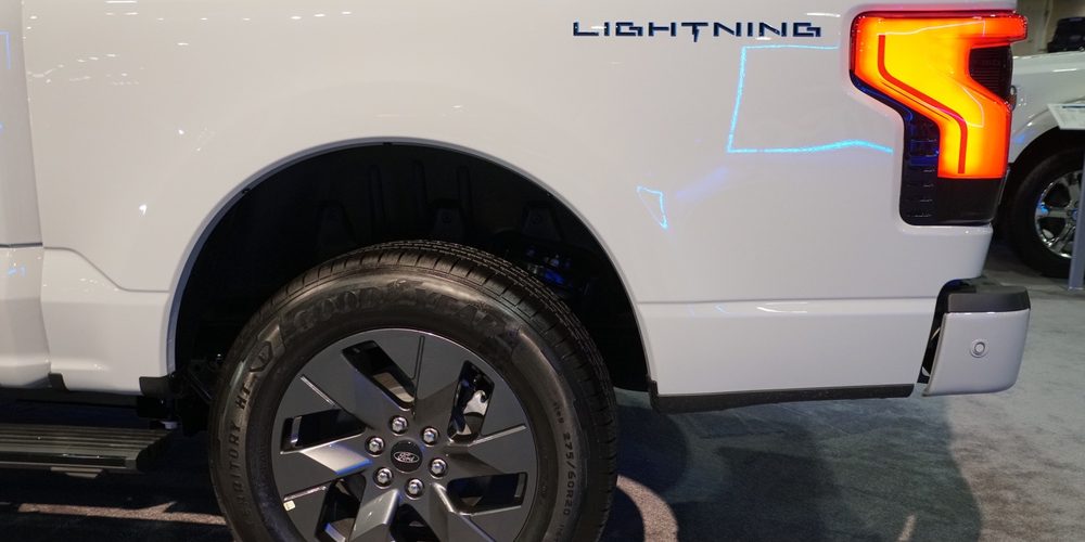 Philadelphia, Pennsylvania, U.S - January 14, 2024 - The back wheel of 2024 Ford F-150 XLT Lightning all-electric pickup truck The back wheel of 2024 Ford F-150 XLT Lightning all-electric pickup truck