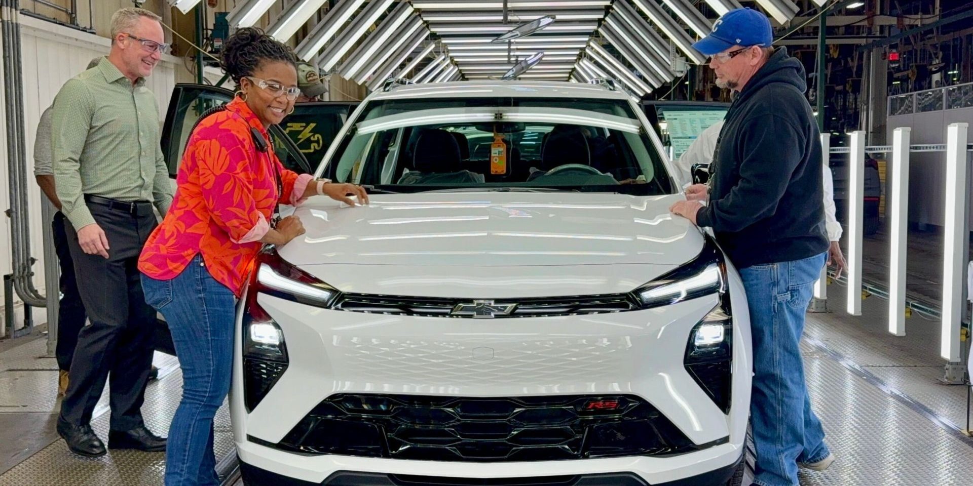 GM employees and a 2027 Bolt at Fairfax Assembly