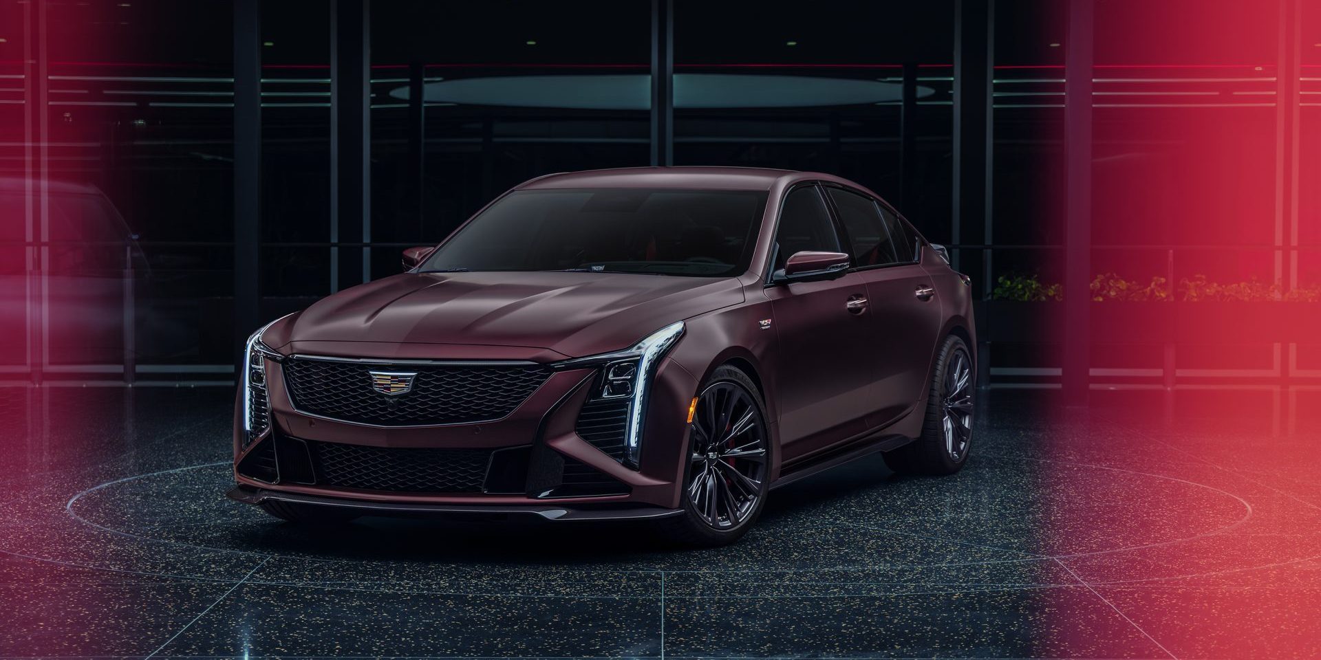 Front 3/4 view of the Curated by Cadillac 2026 Cadillac CT5-V Blackwing in Deep Amethyst Metallic exterior paint color.