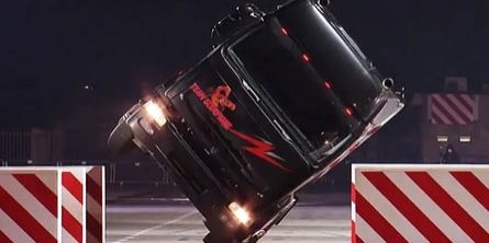 Stuntman Sets Guinness Record Driving Truck On Side Wheels Through Tight Gap