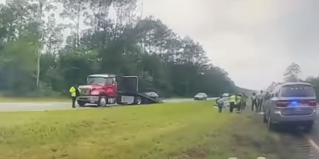 Video – Distracted driver launches Nissan off tow-truck ramp, like a movie stunt