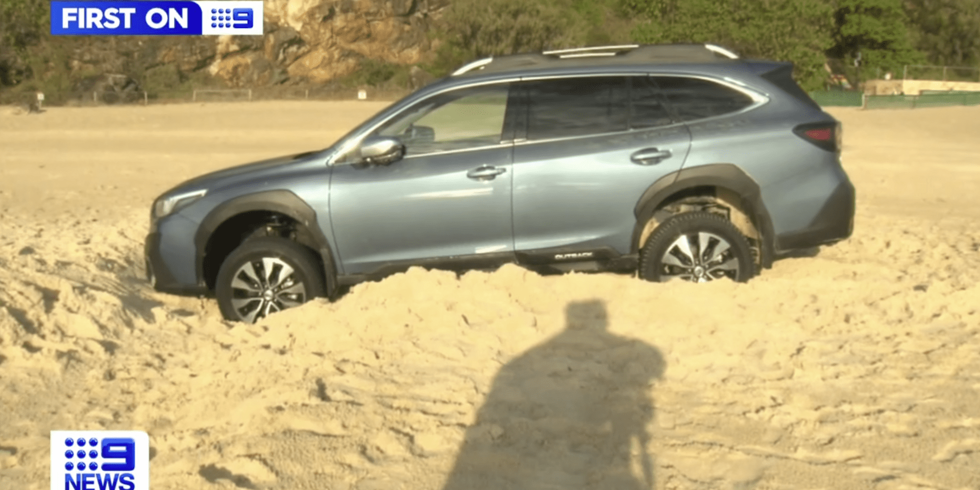 Subaru Outback bogged in sand after driver didn’t realise he was on a beach